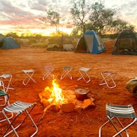 a campfire in the middle of a desert